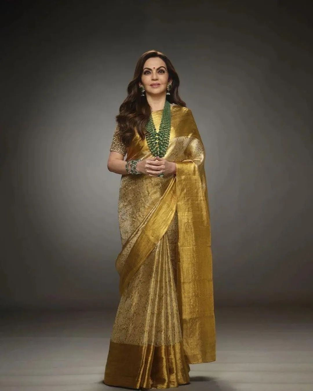 NITA AMBANI MAM GOLDEN EMBOSSED SOFT TISSUE SILK SAREE
