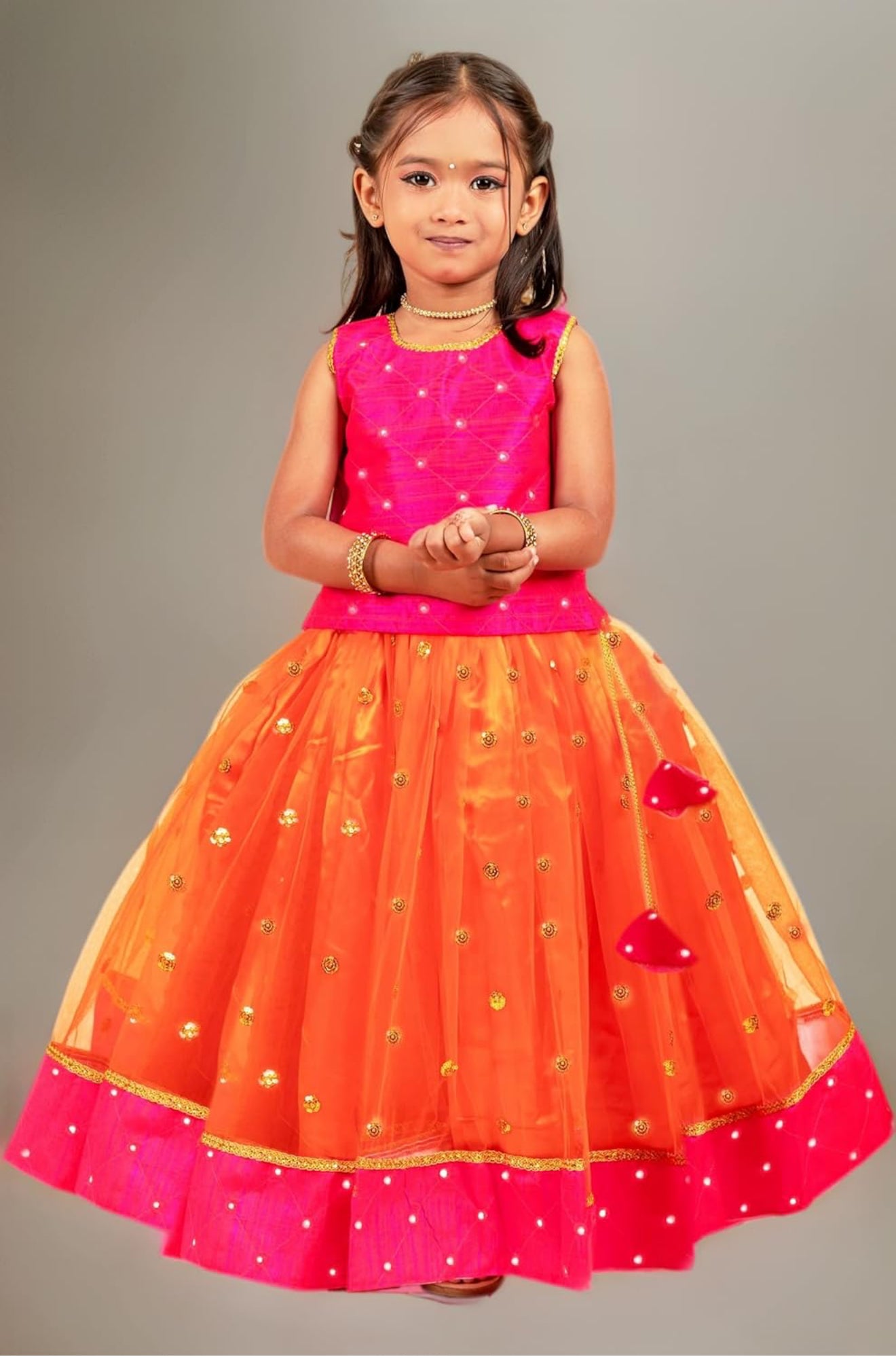 KIDS GIRLS FLARED NET SLEEVELESS LEHENGA CHOLI SET - MAGENTA & ORANGE