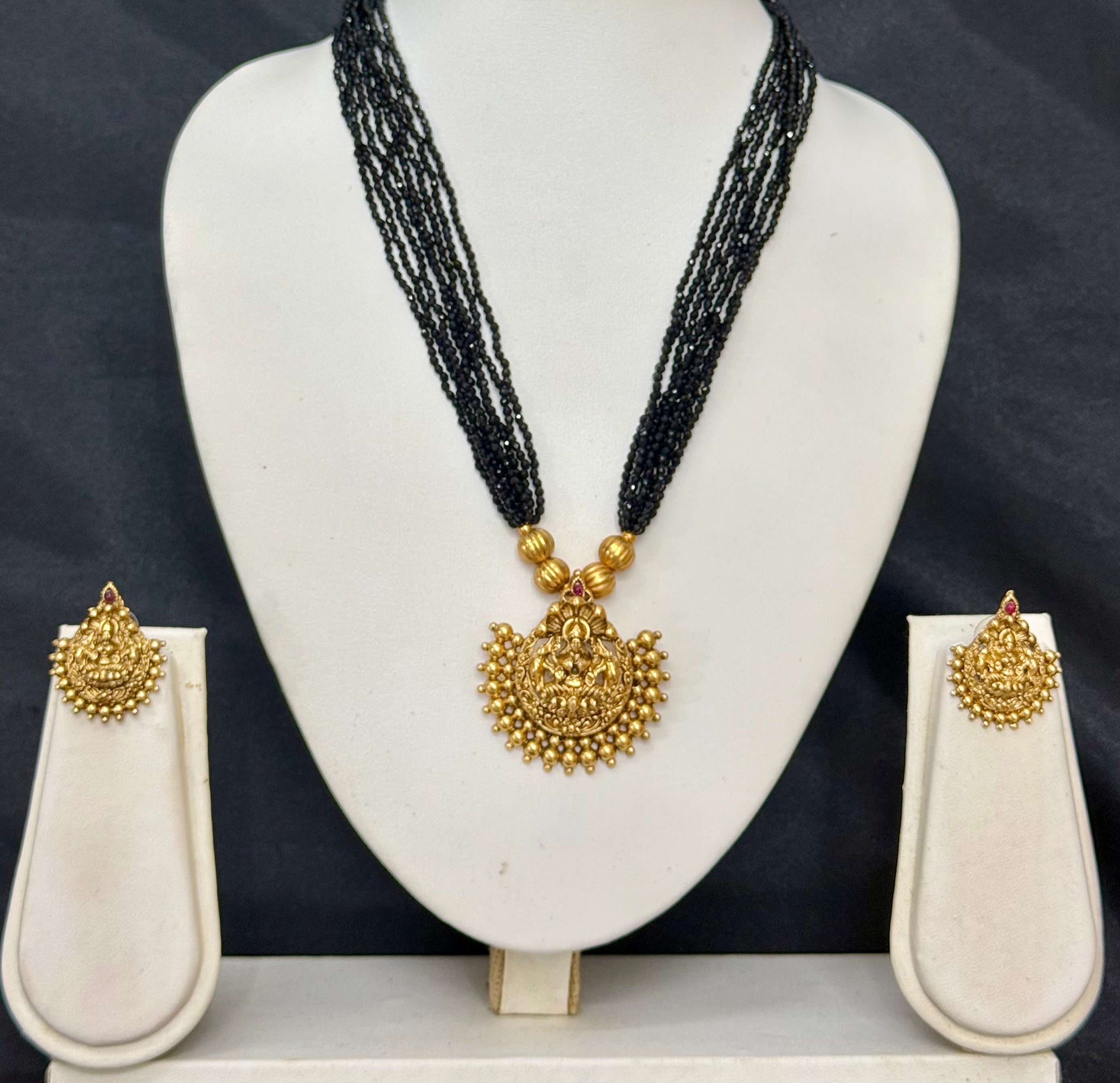 GOLD TONED MULTI STRAND LAKSHMI LONG (23CM) NECKLACE - BLACK