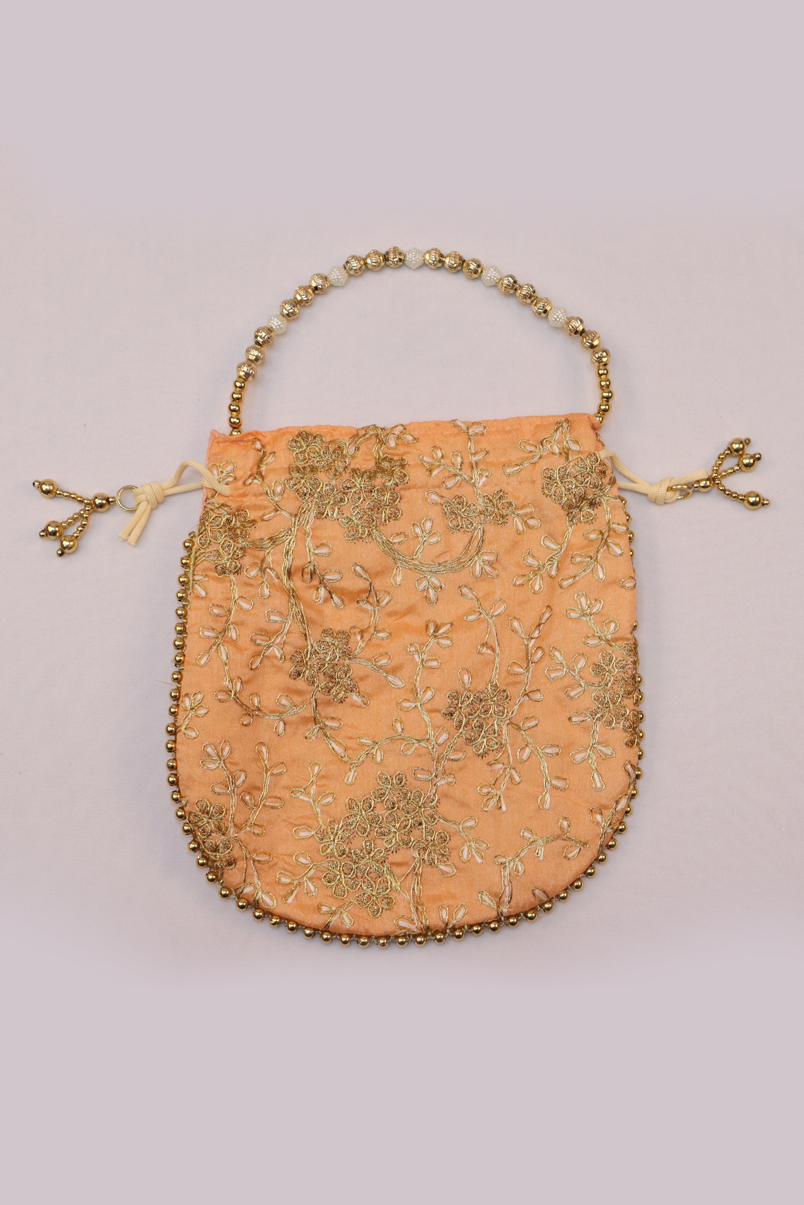 ROYAL ANGURI ZARI EMBROIDERY WORK POTLI BAG FOR WOMEN - PEACH GRABO365