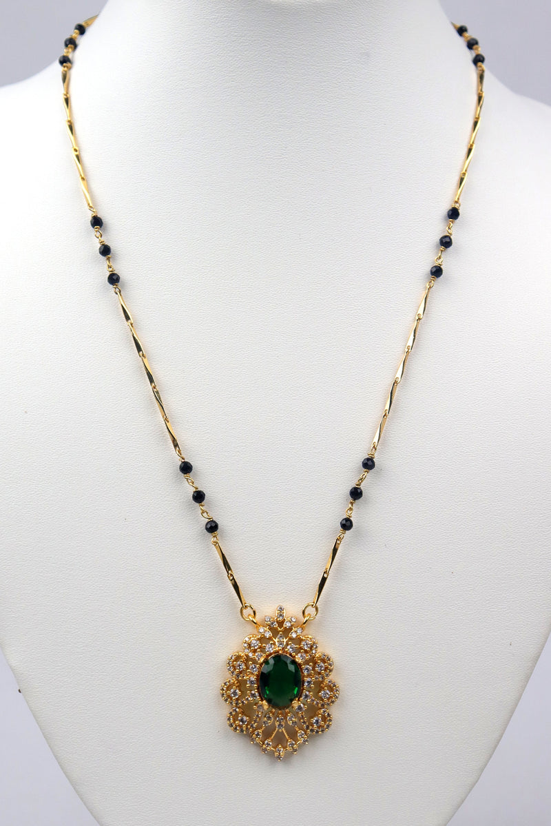GOLD PLATED BLACK BEADED NECK CHAIN WITH EMERALD STUDDED PENDANT GRABO365